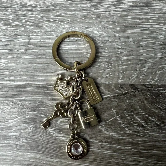 Coach Gold Rhinestone Bow Bag Charm Key Chain | Mercari COACH RARE Designer Keychain Charms In Gold Key FOB With 5 Charms display picture 1